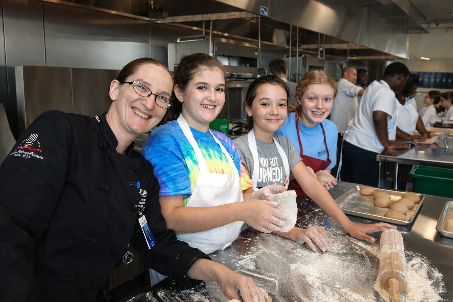 Community education baking class in a teaching kitchen.